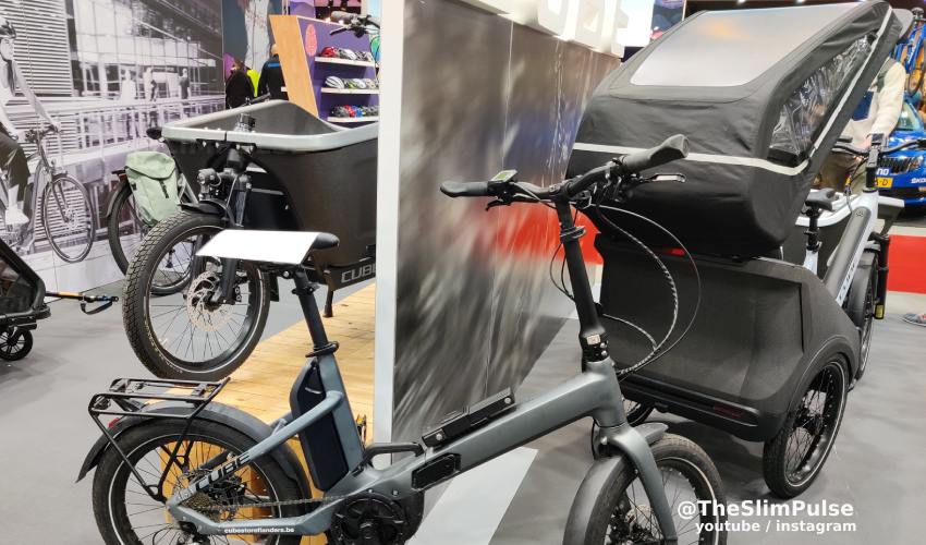 Cube cargo bike on the left and trike on the right