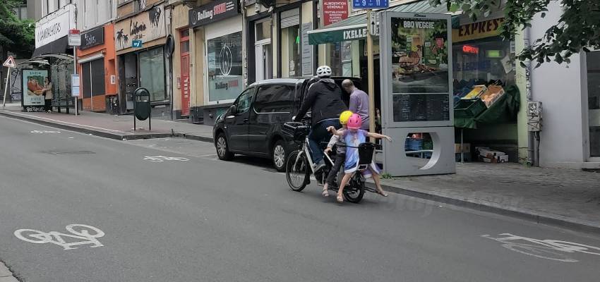 Longtail RadWagon electric bike with two children